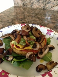 For lunch I sat my Quinoa patty on a bed of spinach and topped the patty with ketchup, mustard, guacamole, and roasted mushrooms. So Good!