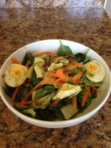 Lunch was a spinach salad with carrots, avacados, and a boiled egg with a homemade spicy honey mustard dressing.